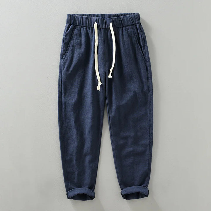 Close-up of the texture of men's cotton linen blend jogger pants, highlighting the fabric.