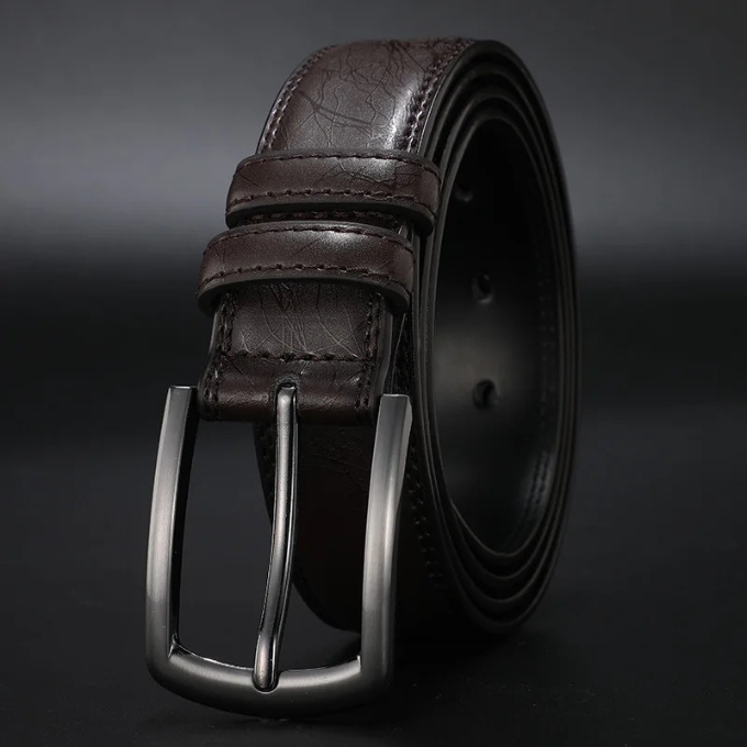 Durable cowhide leather belt for men featuring a stylish gunmetal buckle, a great fashion accessory.
