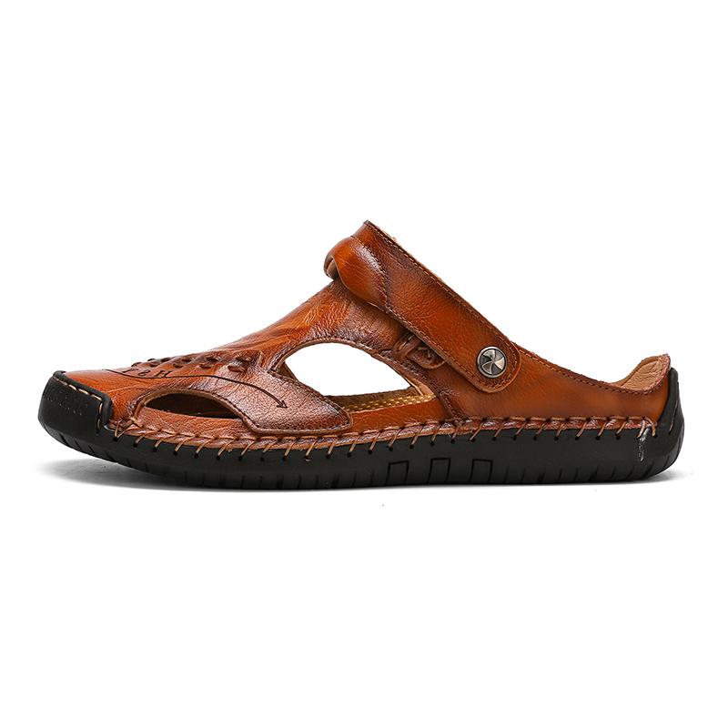 Pair of handmade men's leather sandals with durable sole, perfect for casual wear