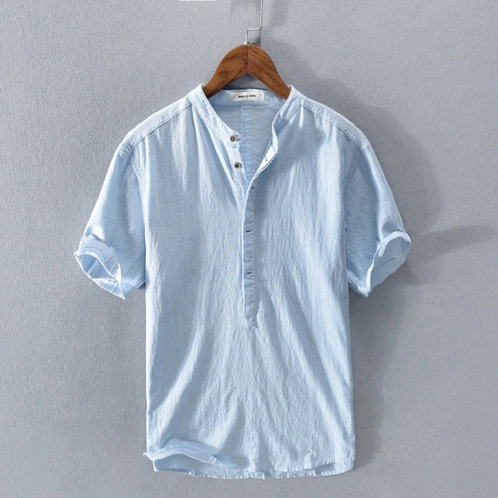 Fashionable men's short-sleeve cotton linen blend top, breathable and ideal for casual wear.