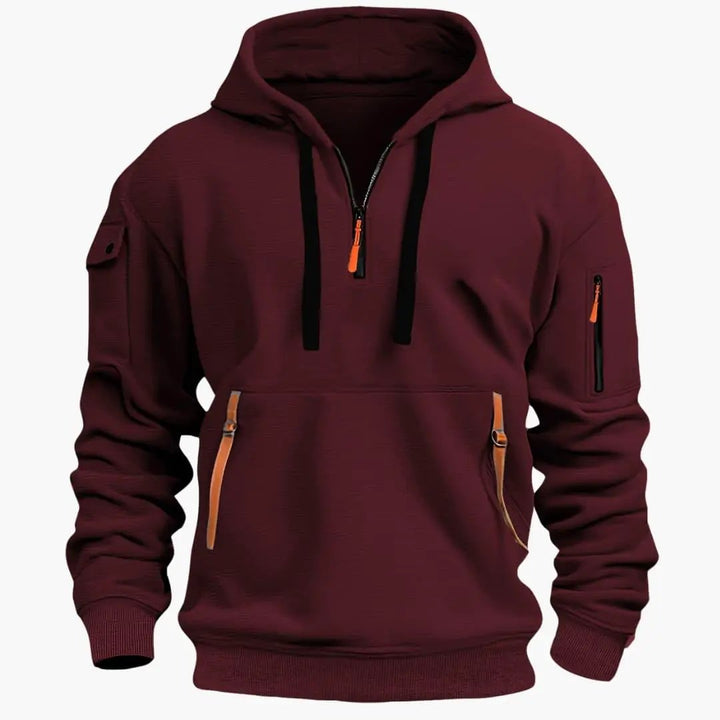 Versatile men's casual pullover hoodie, half-zip design with secure zippered pockets & adjustable hood.