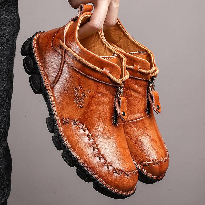 Side profile of men's hand-stitched leather ankle boots, showcasing classic casual fall winter style.