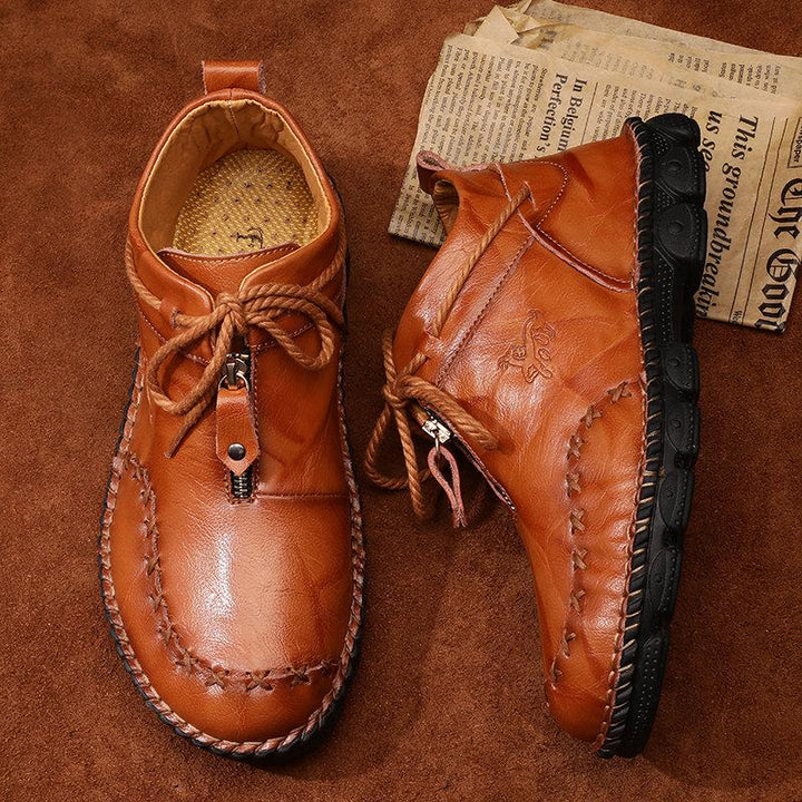 High-quality men's leather ankle boots, hand-stitched for lasting comfort and durability in winter.