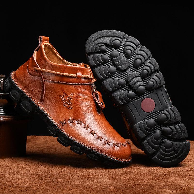 Fashionable men's casual hand-stitched leather ankle boots, essential fall winter footwear.