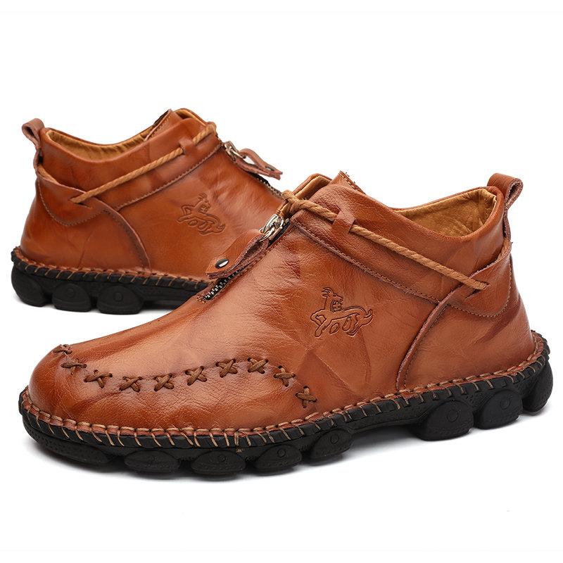 Warm men's winter boots: hand-stitched leather ankle boots offering comfort and fall style.