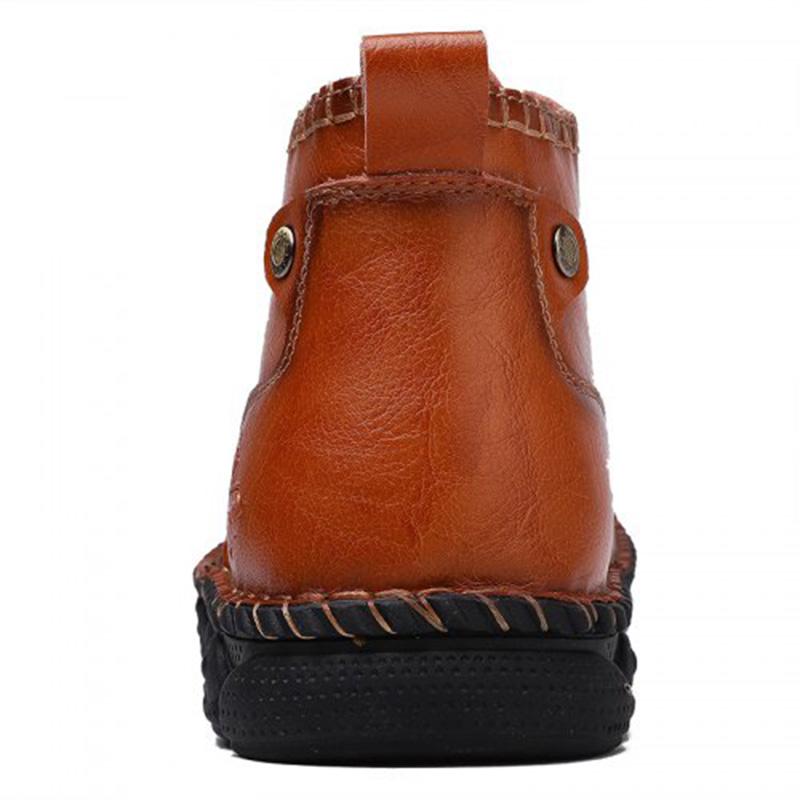 Profile view of men's leather casual boots, highlighting the timeless design and comfortable fit