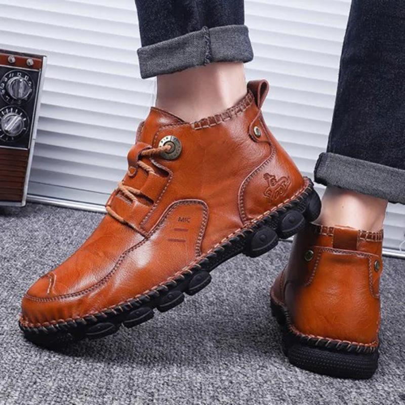 Back view of men's casual leather boots, showing the heel and overall durable construction
