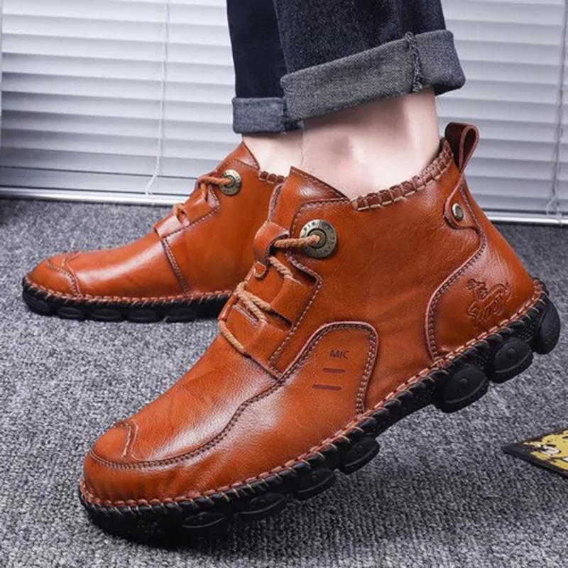 Men's leather boots with a distressed finish, hand stitched for a unique casual look and comfort