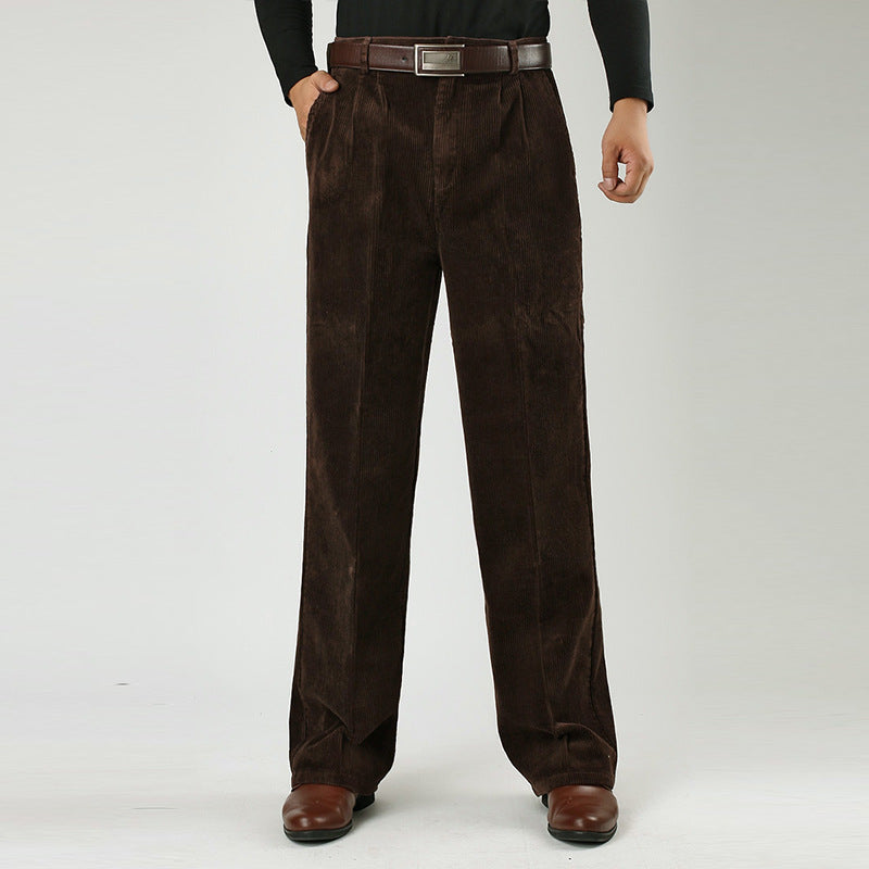 Studio shot of classic men's pleated pants, emphasizing the high-waist and casual style