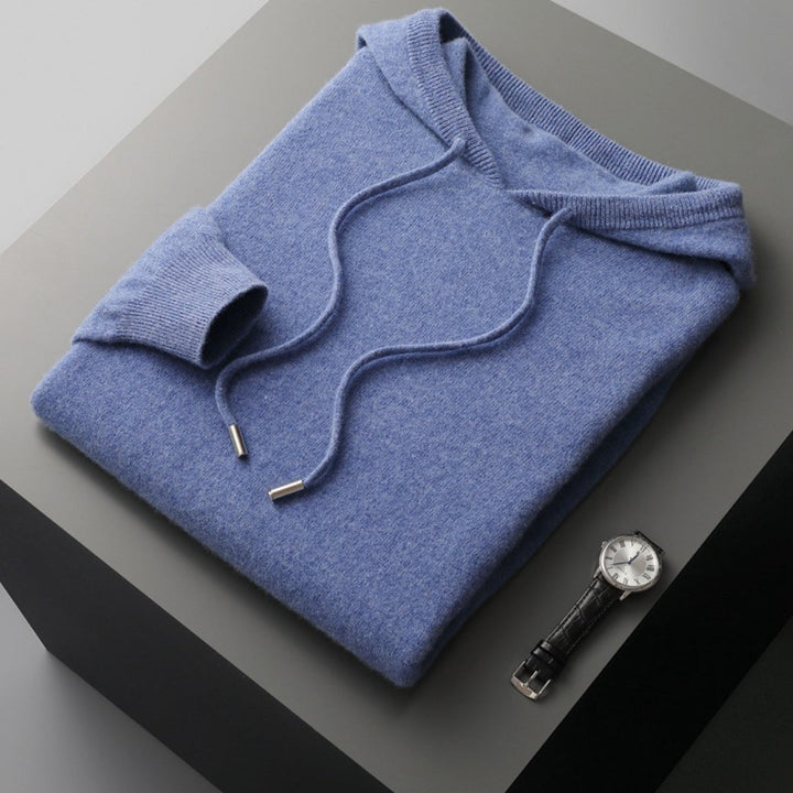 Man wearing a comfortable men's hooded knit pullover, demonstrating styling for everyday.