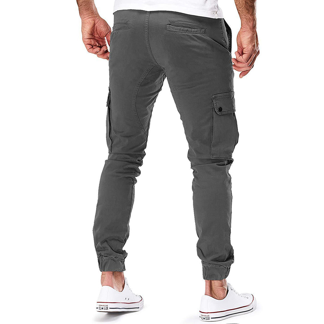 Close-up of side pocket on men's cargo trousers, showing durable stitching & fabric