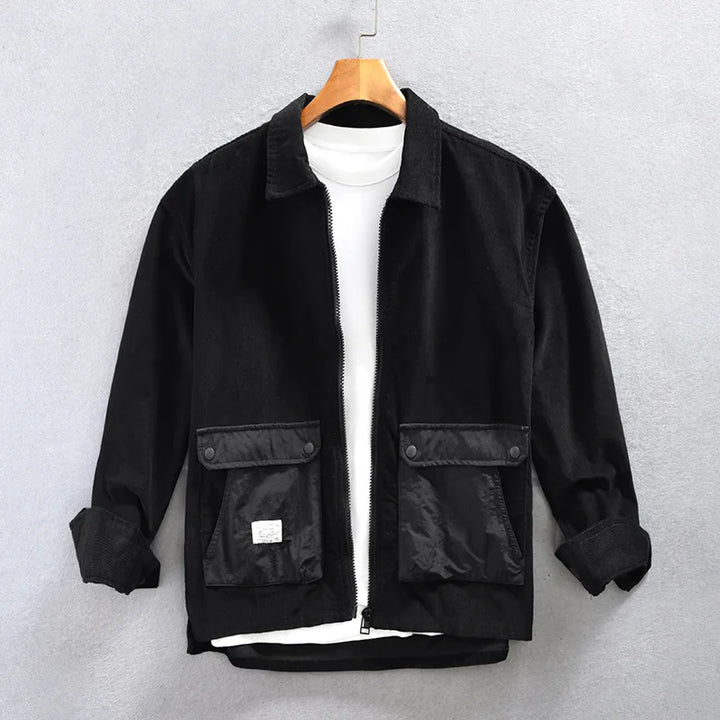 Stylish black corduroy men's jacket with a full zip, ideal for casual wear and cool weather outfits.