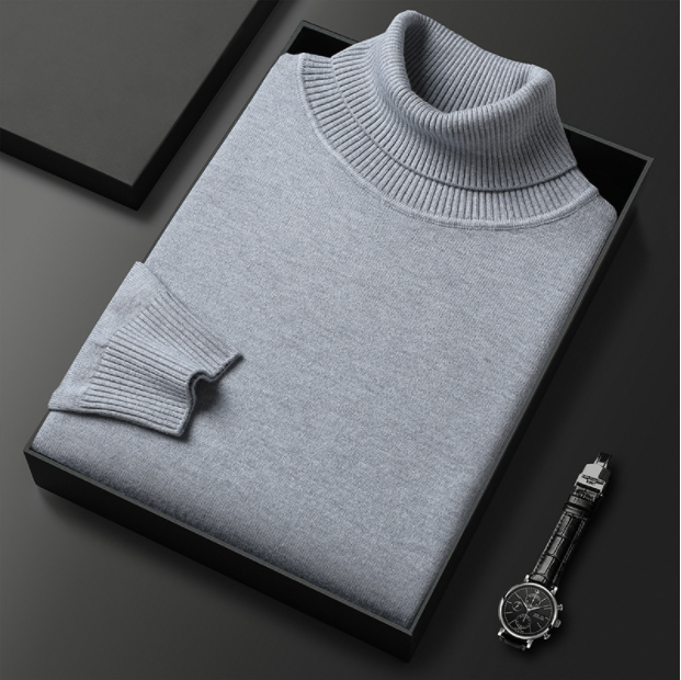 Close-up of the hem of a men's long sleeve casual knit turtleneck sweater.