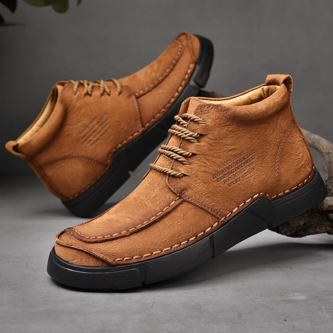 High-top men's winter boots, casual leather design, durable and supportive with a soft sole.