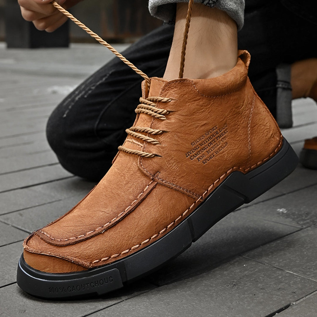 Durable men's high-top winter boots, quality leather with a soft sole for cold weather.