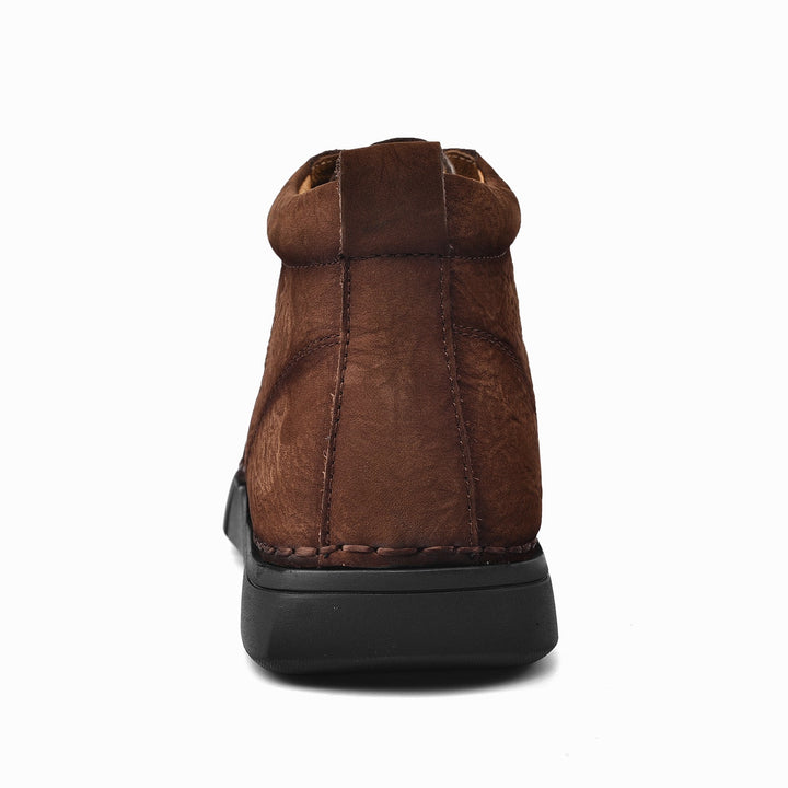 Stylish men's casual leather high-top boots, built for winter durability and soft sole comfort.