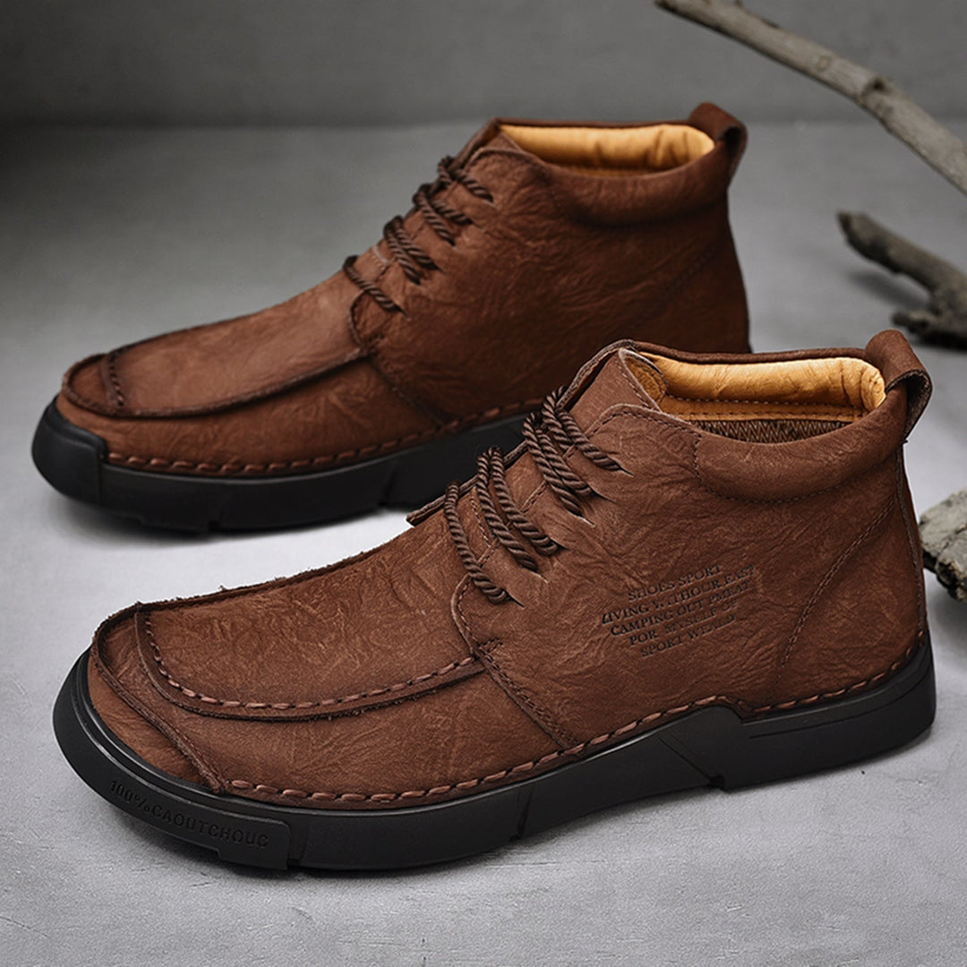 Men's fashion high-top leather boots, soft sole adds orthopedic comfort for winter elegance.