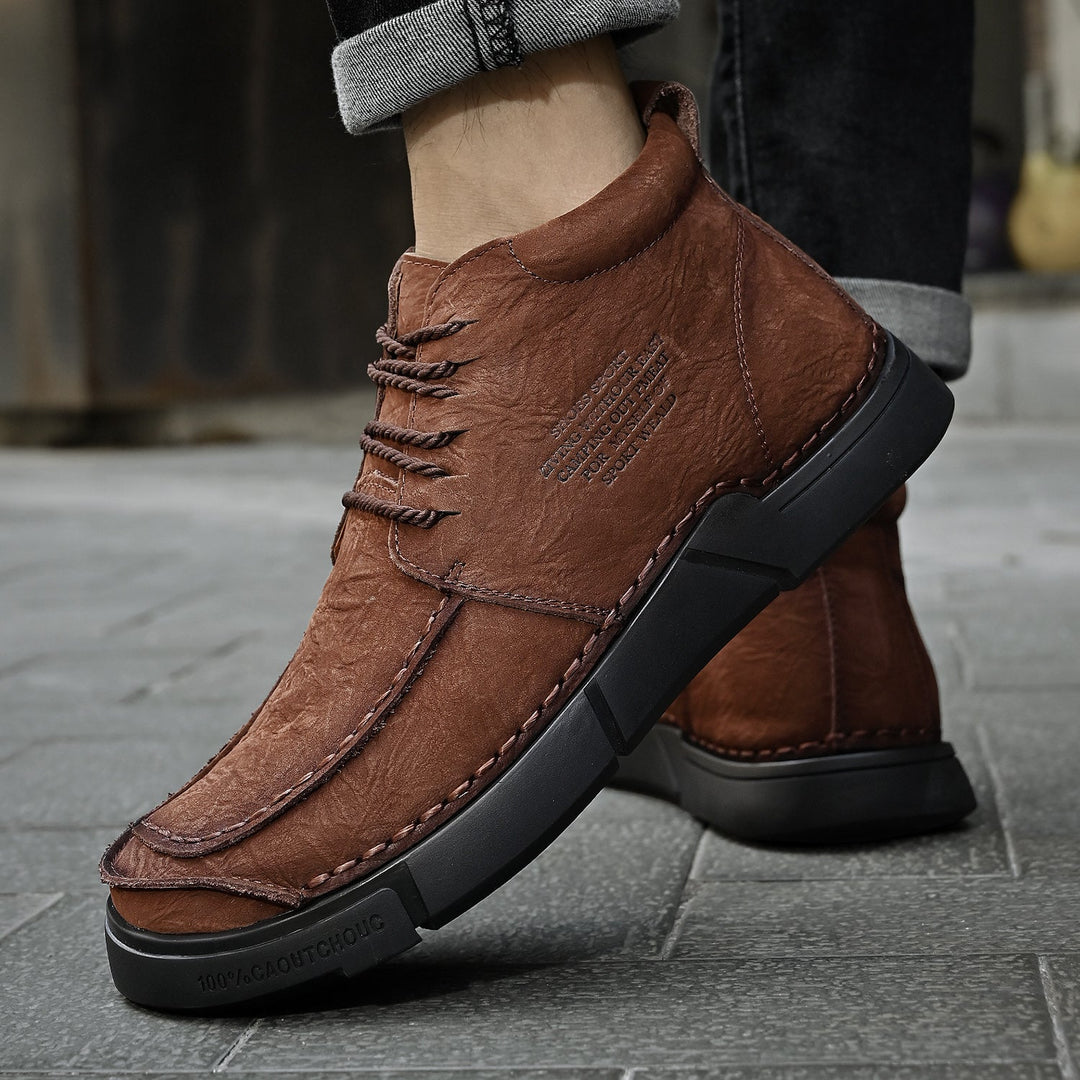 Durable men's high-top winter boots, high-quality leather with a soft sole for warmth.