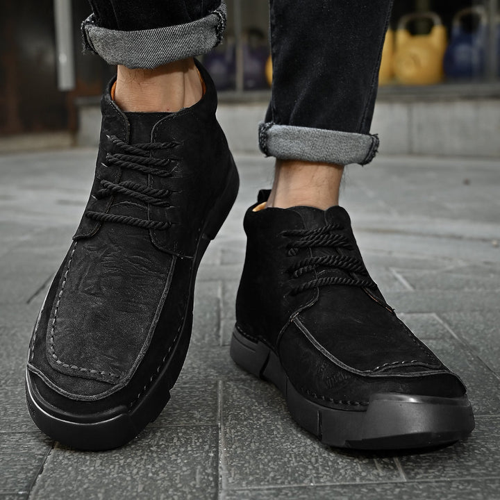Stylish men's casual leather high-top boots, built for winter durability & soft walking.