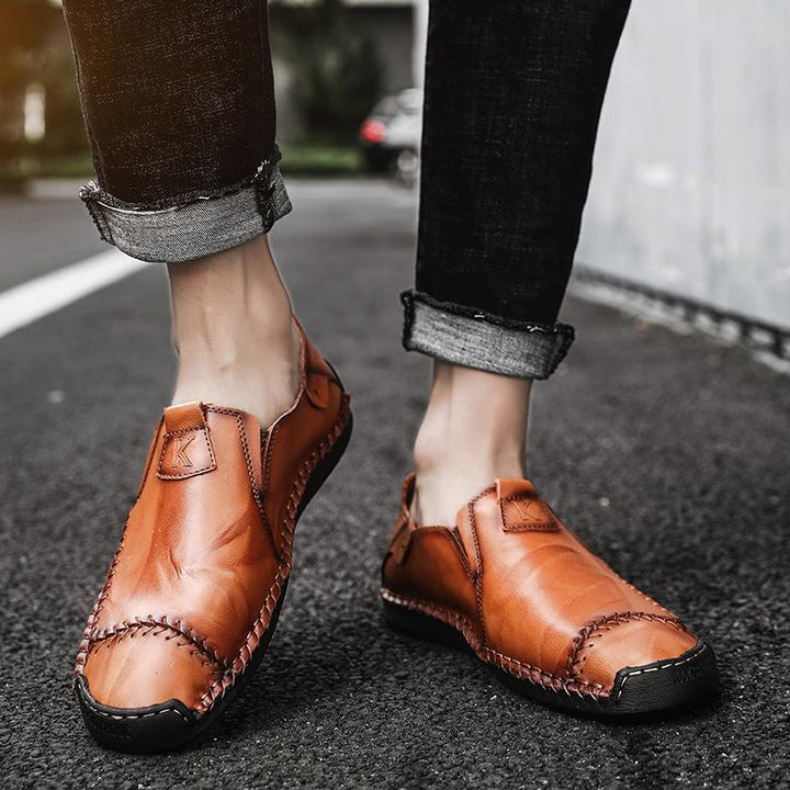 Back view of men's everyday leather shoes, emphasizing the quality genuine leather and soft sole