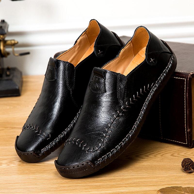 Close-up of the non-slip soft sole on men's genuine leather hand-stitched casual shoes