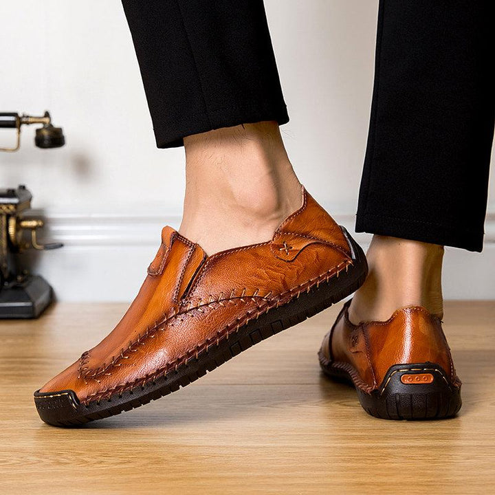 Side profile of men's comfort shoes in leather, featuring a soft non-slip sole for stability