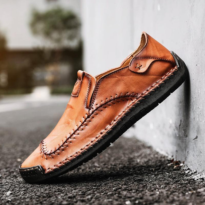 Front view of men's genuine leather comfort shoes, designed with hand stitching and a soft sole