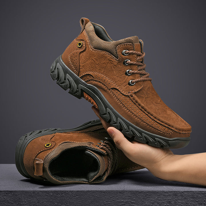 Men's casual suede short boots, shown on a rustic outdoor background