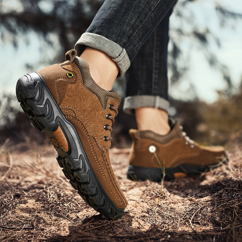 Men's short snow boots made from durable brown leather, warm lining