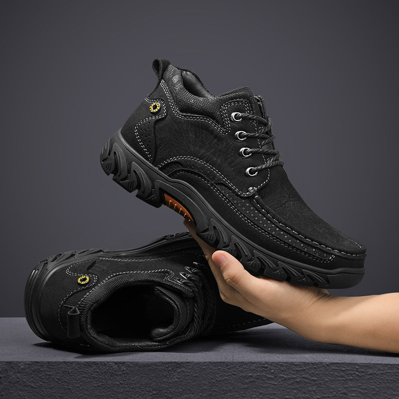 Back view of men's leather work boots, showcasing the heel support