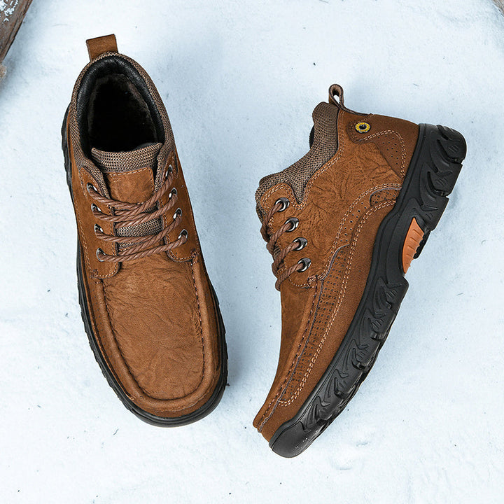 Side profile of men's short casual leather boots, dark brown color