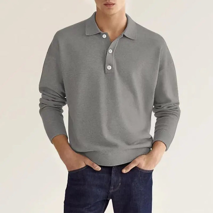 Detail of the collar and buttons on a men's long sleeve knit polo shirt for men's fashion