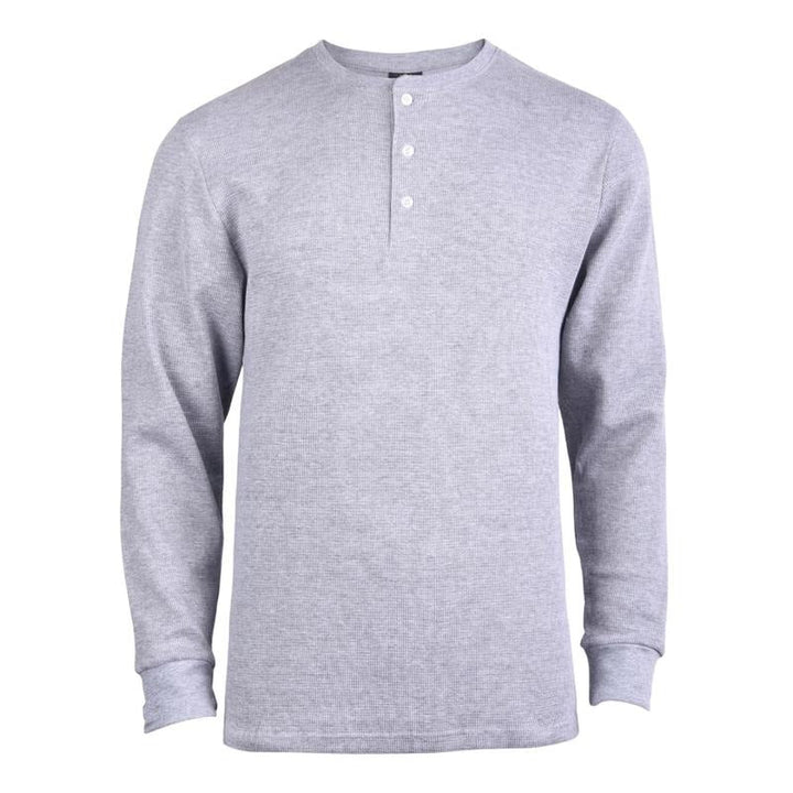 Close-up of the textured waffle knit fabric on a men's stylish Henley long sleeve shirt.
