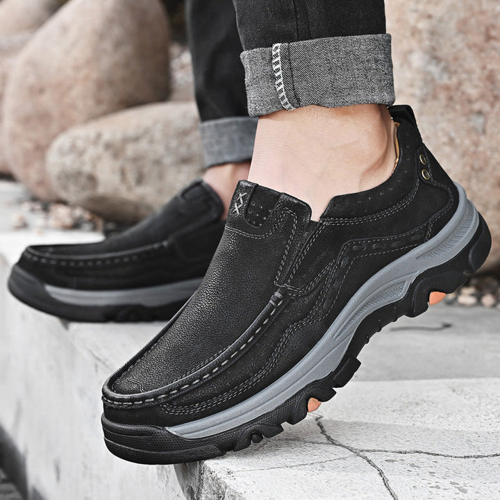 Brown leather slip-on shoes for men, providing orthopedic comfort and a versatile casual look.