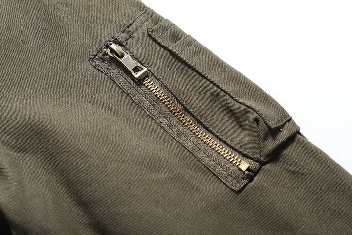 Men's casual jacket in a natural setting, emphasizing its outdoor utility and comfortable design.