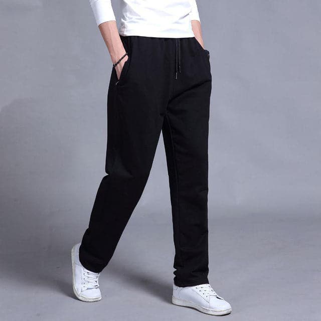 Men's casual relaxed fit spring pants in a light khaki color, perfect for everyday wear.