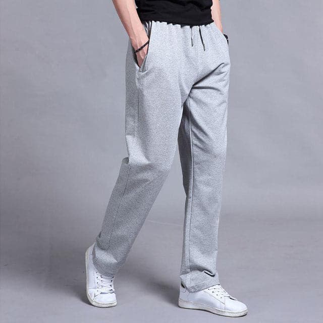 Close-up of the fabric texture of men's casual spring pants, highlighting their comfortable feel.