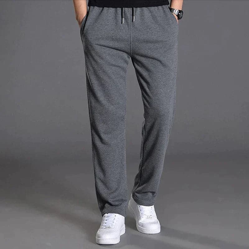 Men's everyday relaxed fit pants in a classic navy, suitable for spring casual menswear outfits.