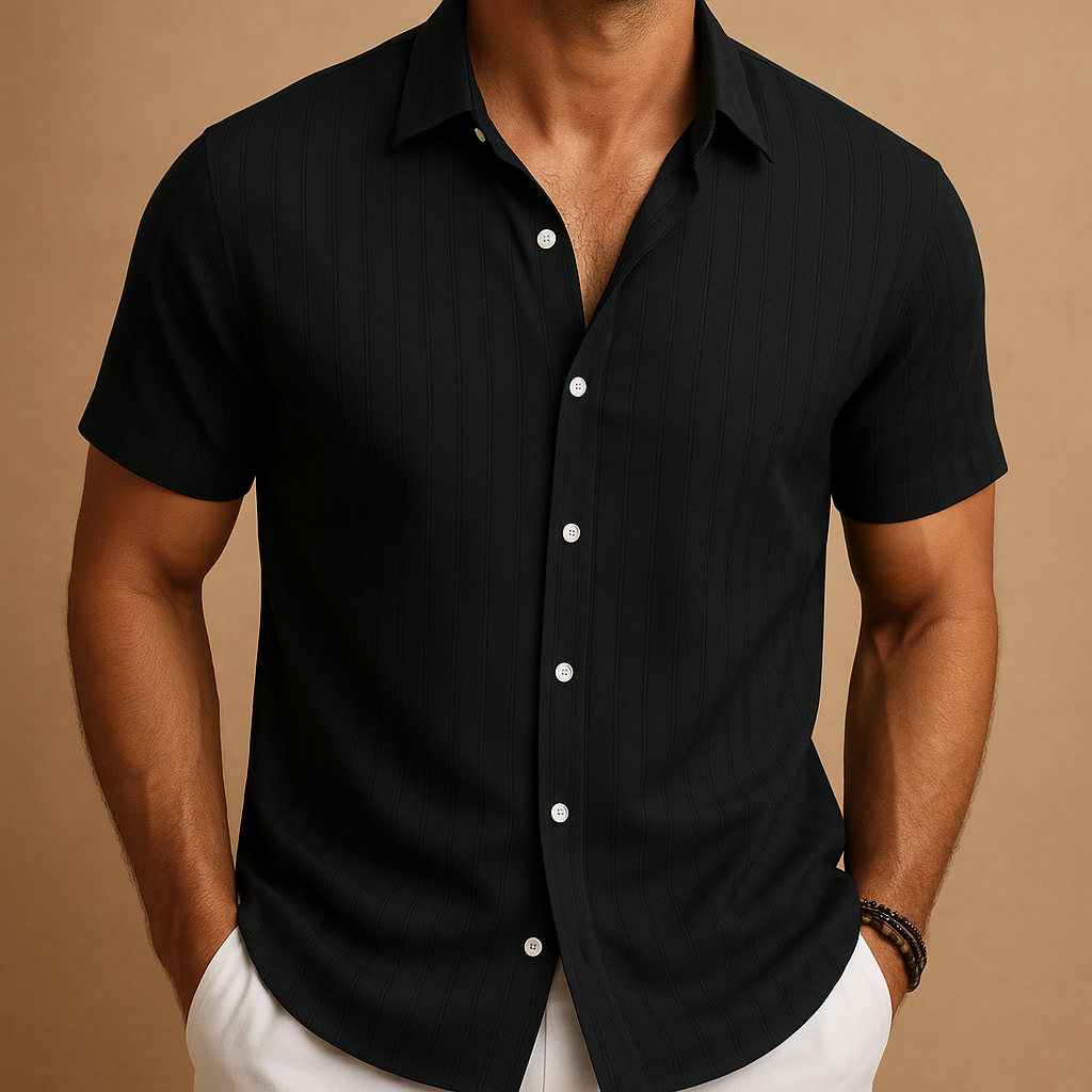 Warm weather men's shirt, short sleeve, button-up, offering a relaxed yet refined casual style.