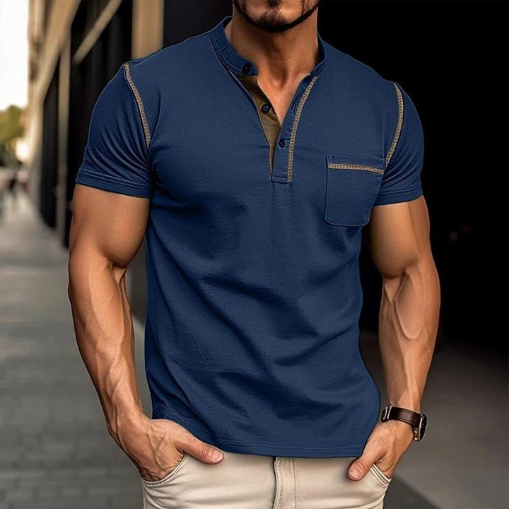 Close-up of a men's slim-fit Henley t-shirt, showcasing the button placket. Casual summer top for men.
