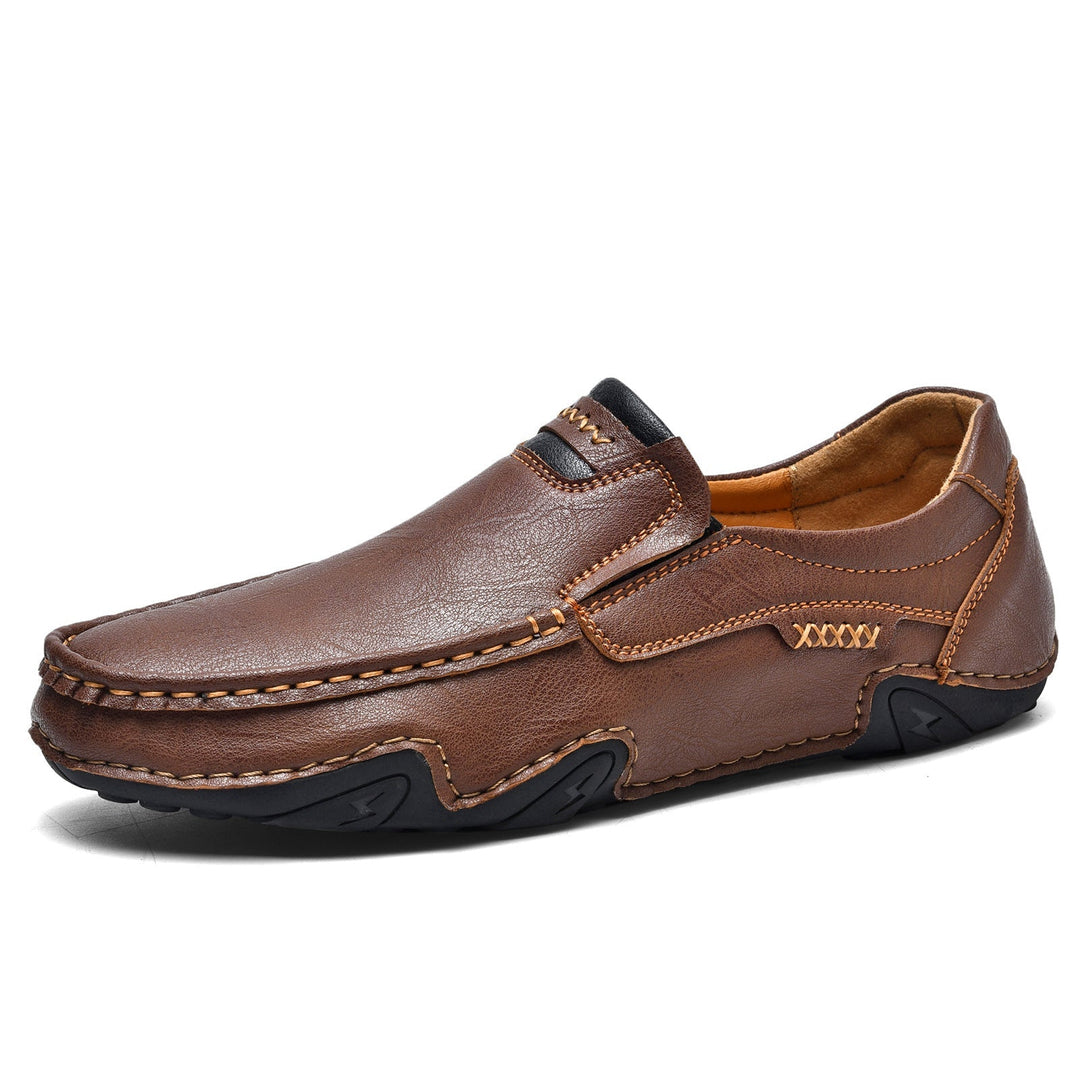 Front view of men's casual slip-on loafers, exhibiting their classic design and faux leather finish