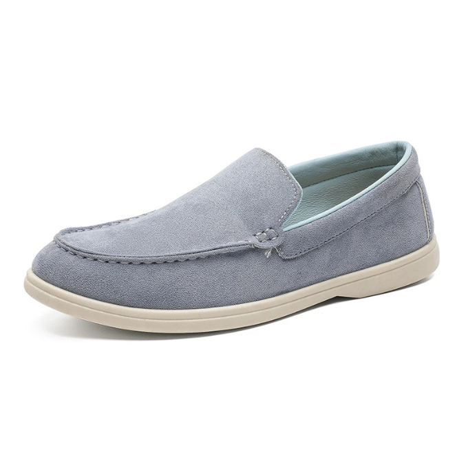 Collection of men's suede-look loafers in various colors, offering diverse casual footwear options.