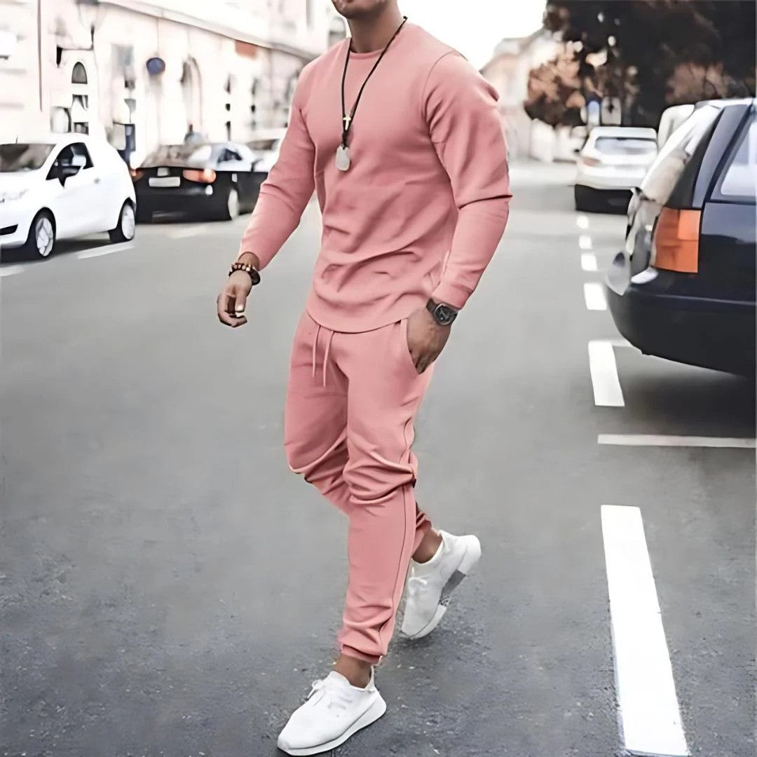 Athletic men's two-piece tracksuit in grey, designed for comfort fit, great for everyday casual wear.