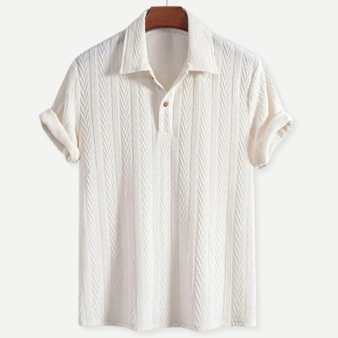 Close-up of a breathable men's cotton polo with a unique chevron knit texture, perfect summer fashion.