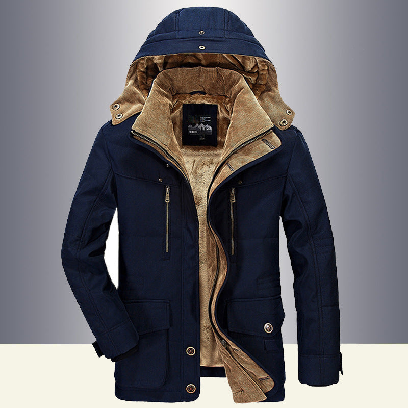 Detail of the practical pockets on the men's corduroy sherpa lined winter parka
