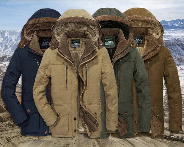 Man wearing a stylish men's corduroy sherpa lined parka, walking outdoors in winter weather