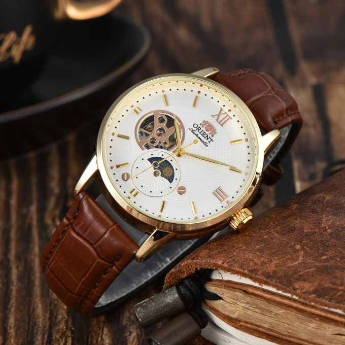 Close-up of a men's classic mechanical watch dial, showing intricate sun moon complication