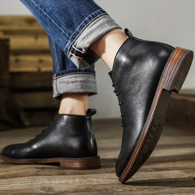Collection of men's leather boots: Chelsea, chukka, and dress styles, all types of footwear.