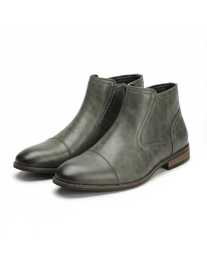 Men's classic black leather Chelsea boots with side-zip for easy wear and dressy or casual style.