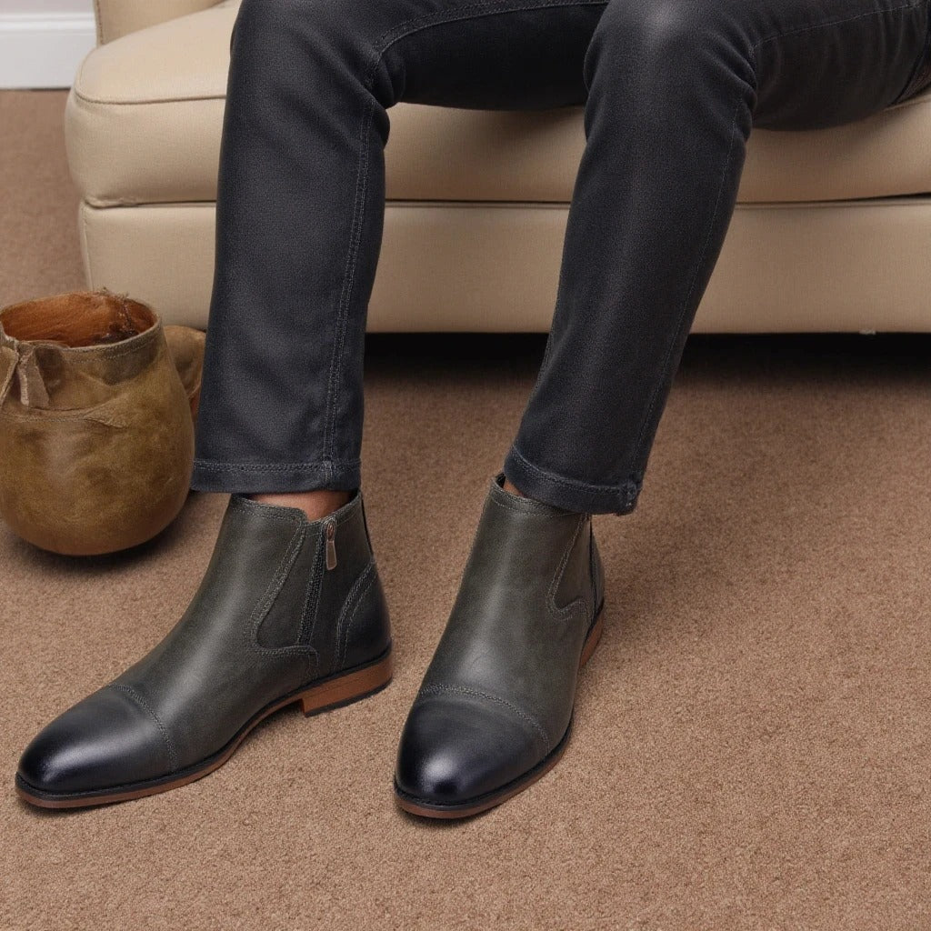 Full-body shot of men's brown side-zip Chelsea boots, an essential for everyday wear and smart casual looks.